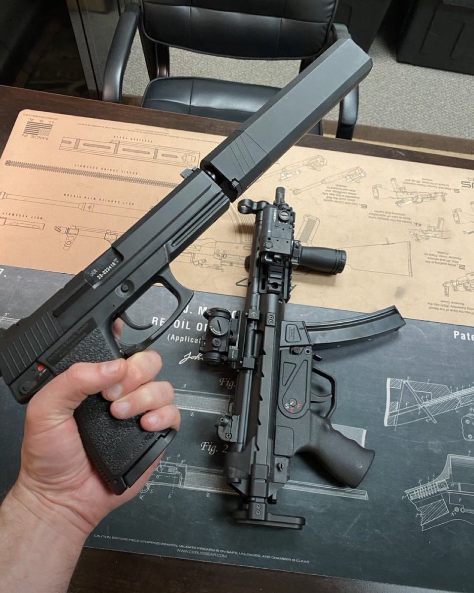 WeaponsVault's tweet photo. MK23 &amp; MP5. https://t.co/UqwZPMvjpm