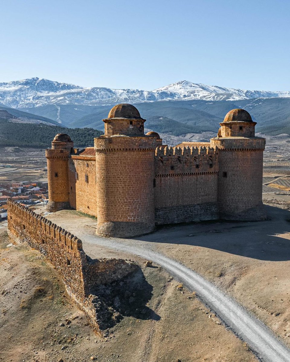 Castle Calahorra Andalucia Spain with a mix of desert and mountains.