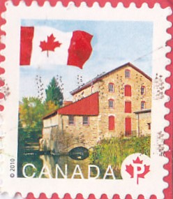 MarjeMolder's tweet photo. Continuing my 80th year by daily posting #Canadian #flags on #stamps until #MarkCarney becomes PM. Still celebrating #historic #mills, today's flag is flying over the #OldStoneMill (an historic site) in Delta #Ontario #CanadaElection2025 #ElbowsUp #FlagsFlying #philately https://t.co/gi9h09Im8E
