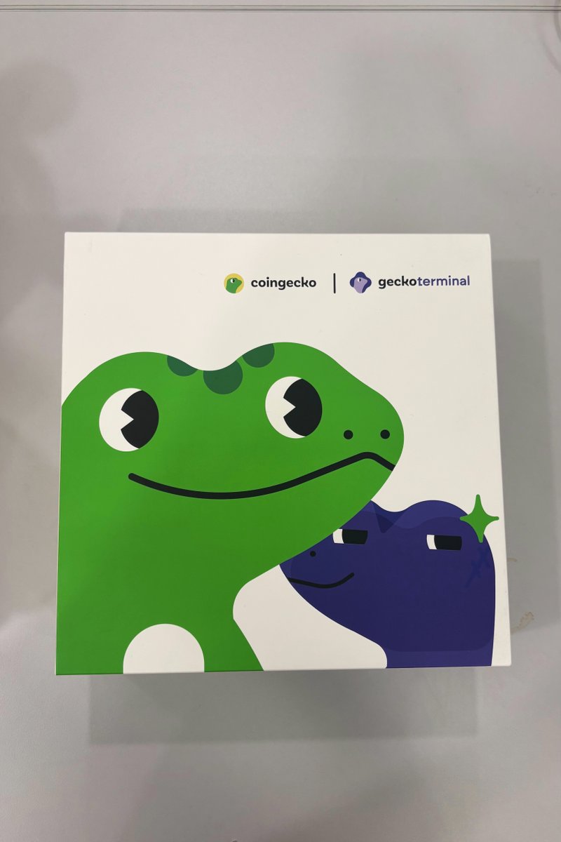 coingecko's tweet photo. POV: You just opened our exclusive swag box. 📦✨

Inside, you’ll find:
• CoinGecko tees
• Gekko + Rex plushies
• Stickers to flex your Gecko pride

Want one? Stay tuned... https://t.co/IG16QclcD8
