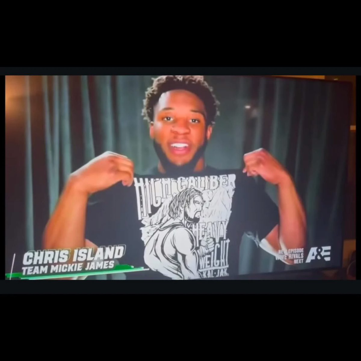 So cool to see <a href="/ChrisIslandwwe/">Chris Island</a> 
  talk so proudly about <a href="/Kal_Jak/">Dad</a> 
 his wrestling coach 
And how Chris is using a move created by kal Jak and even naming it after him 
The KJP (KAL JAK PROMISE) 
Sporting his shirts I designed on an episode of wwe lfg
on <a href="/AETV/">A&E</a>