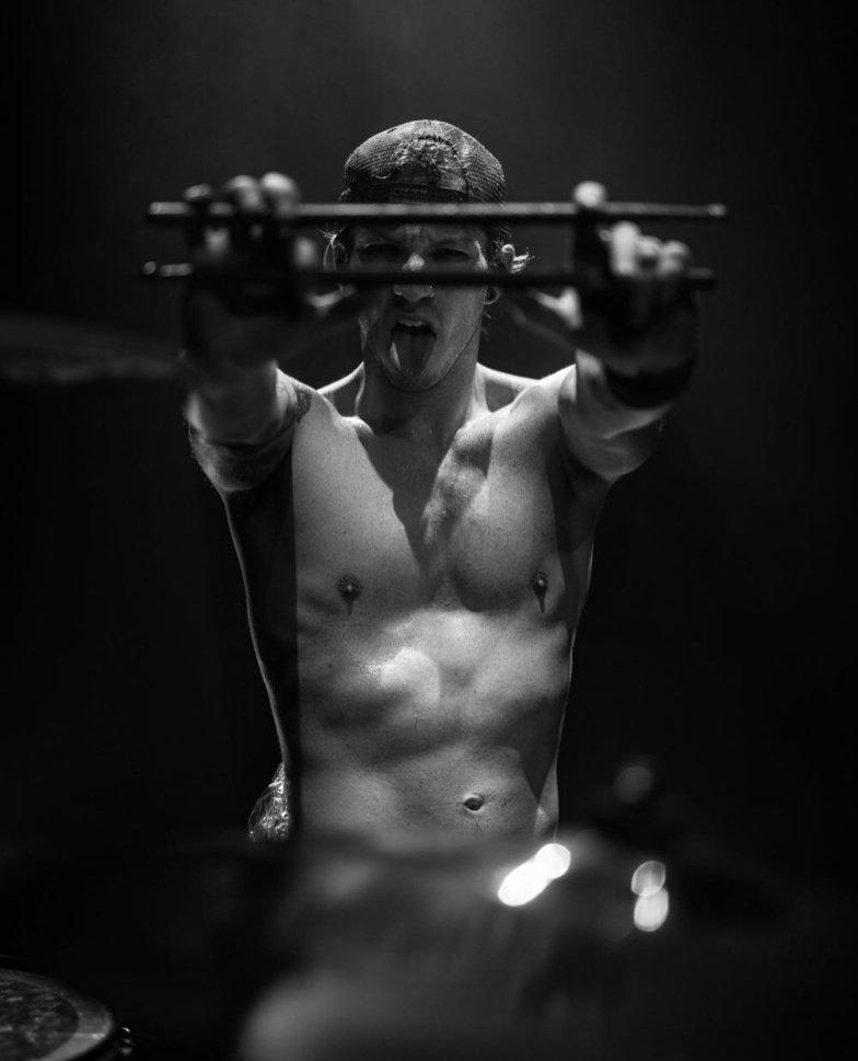 DinDesu's tweet photo. Hellooo! Please help! I'm looking for a picture of josh looking through his drumsticks. It's a front angle pic and he's making a fun expression. It's a mix between the 2 on the post. I've seen the picture before I just can't find it anywhere now https://t.co/MuWrow2if4