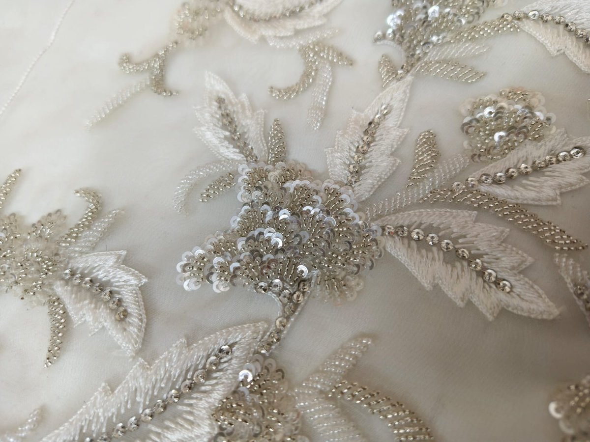 Luxurious floral embroidery in silver tones – handcrafted with sequins, beads.Ideal for bridal gowns, veils, and couture creations.

Contact Us for More Details
info@sadulbadul.com
+91 91363 04295
Visit Our Website: sadulbadul.com

#SadulBadul #LuxuryEmbroidery