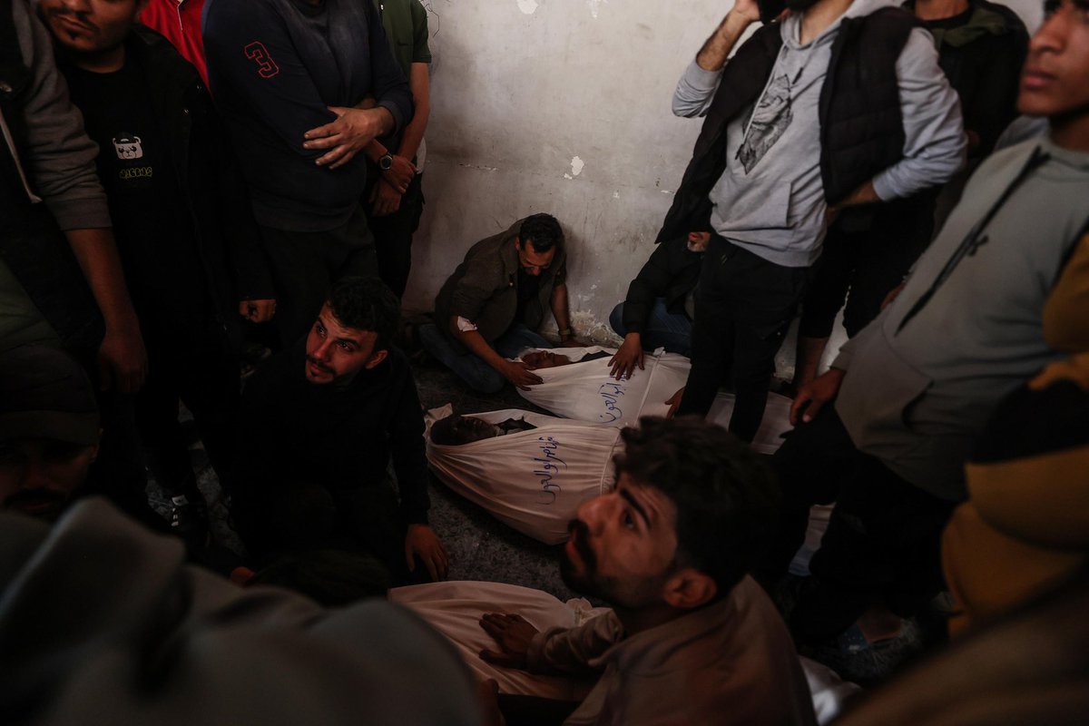 People mourn as bodies of Palestinians, who lost their lives following the Israeli attacks on different regions, are taken from al-Ahli Baptist Hospital for funeral process in Gaza City, Gaza on April 10, 2025. (Photo by Ali Jadallah/Anadolu via Getty Images)