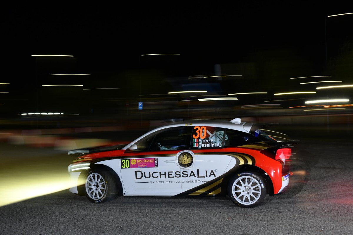 lancia_official's tweet photo. Lights on, engines roaring: #RallyRegionePiemonte starts with a night show full of racing energy and local vibes. 🔥

#Lancia #LanciaIsBack #NewLanciaYpsilon #YpsilonRally4HF https://t.co/jka2NQuRXe