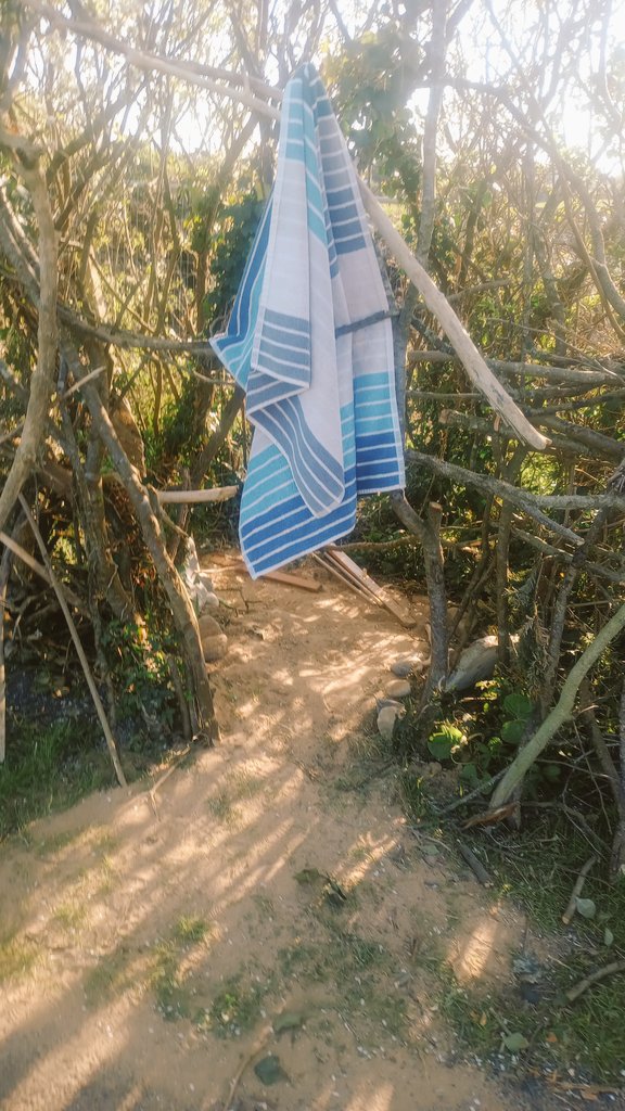 I was up in our now community hub &amp; playground and was delighted to see evidence of children at work. A cool hideout incorporating branches, rocks and sand built into the hedge. Lots of work gone into weaving the branches together &amp; collecting rocks. Great to see kids being kids