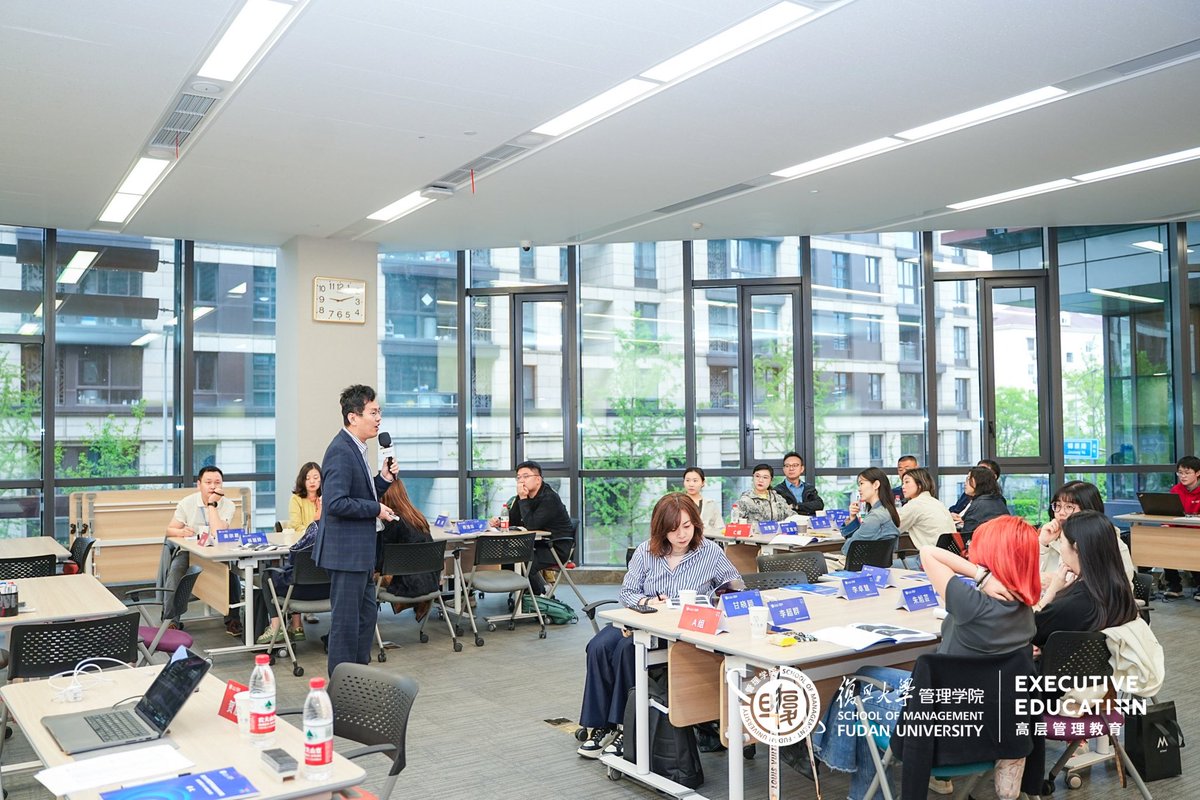 OnicekHe's tweet photo. Today I taught at Fudan University’s School of Management. This was my second year delivering the “Marketing Strategy: Objectives and Outcomes” course to CMOs, where I use economic theories to explain marketing challenges. By combining theory, real-world cases, and group-based simulation games, I aimed to help everyone better understand the importance of internal goal alignment and how to reduce information friction within organizations.

One student from the consulting industry shared a comment at the end of the morning session that made me smile. He said a good professor should help the class achieve the “three no’s”: no sleeping, no bathroom breaks, and no phone scrolling—and apparently, he managed all three. I’m thankful for such kind words, and I’ll keep reflecting, iterating, and improving.

Many students commented that the course felt too short and they were left wanting more—some even hoped it could be extended into a two-day format. Objectively speaking, I’ve come to realize that many of us, especially in our 40s and 50s, enter what I call a Reflective Phase—a time when teaching is no longer just about knowledge delivery. If we merely repeat what we already know, the excitement fades. But when we teach what we’re currently exploring and genuinely curious about, the joy is much greater—for both teacher and students.

That’s why course design matters deeply. It’s not just about inspiring students—it’s about inspiring ourselves. This is true co-creation. Toward the end of today’s class, I also shared one of my ongoing interests: inefficiencies in post-collaboration behavior, such as accounts receivable issues in the advertising services industry. When I was in Hong Kong recently, I also discussed my views on short-form online dramas, web novels, and livestream content. The students were truly engaged—and that energy is contagious for the teacher as well.

So, if course design is simply about perfecting our slides, refining our language, and delivering polished knowledge, hoping students will absorb it all—that no longer makes sense in today’s environment. Going forward, I want to keep developing themes that genuinely energize me. Not just well-structured content, but fresh ideas and creative sparks that we can discover and explore together.

Big thanks again to the leadership at Fudan SOM for your continued trust. Let’s keep learning and growing—together.