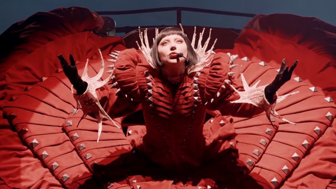 LMonsterReacts's tweet photo. lady gaga didn’t headline coachella. she reimagined it. the direction, the operatic arrangements, the theatricality, the vocals, the architecture, the costumes, the light design. wagnerian in ambition, pop in language, divine in execution. https://t.co/ar6EeSFyYg