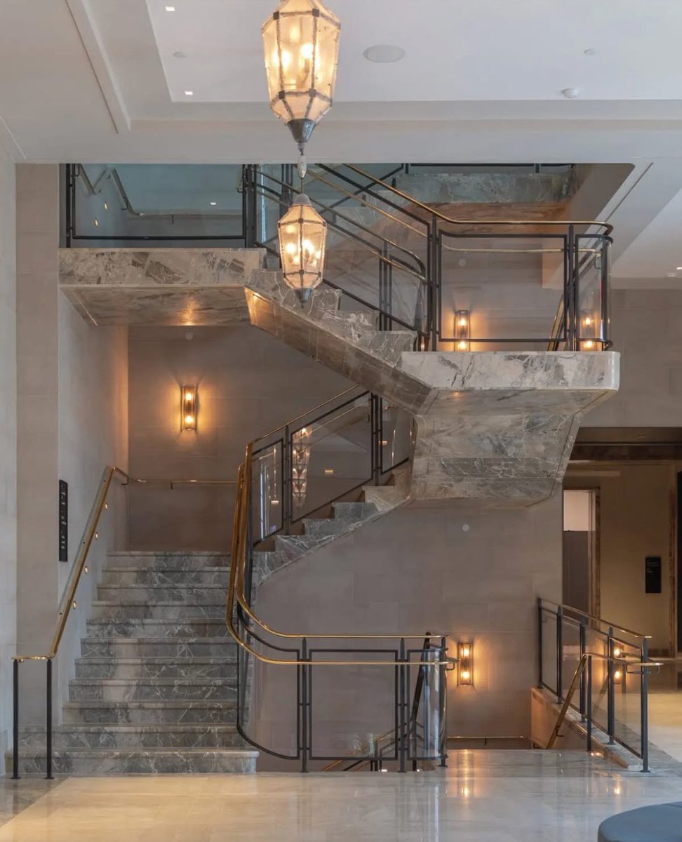 312GildedAge's tweet photo. Talk about a showstopper! The new cantilevered staircase at The Frick in NYC spans four floors, made from 18 tons of rare Breccia Aurora Blue marble from Italy. A bold, elegant feat of design that’s turning heads—and floating like a dream. #TheFrickCollection https://t.co/FFdJfdTrt9