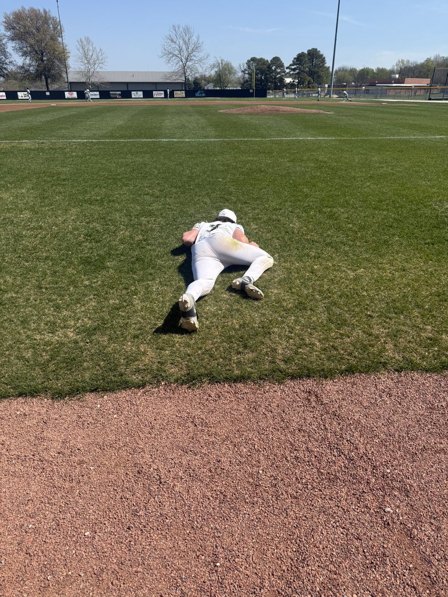 Junior, Tyler Davis is ready for the game with his pre-game nap on the field