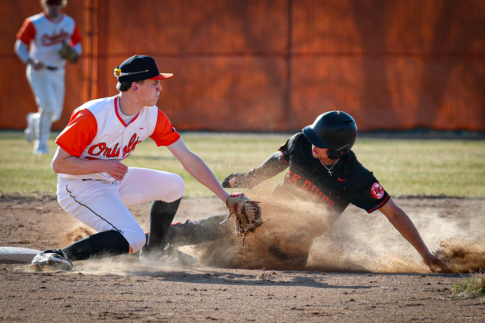 OsseoSports's tweet photo. Great to be outside this spring, Osseo Baseball wins 4-1 over Elk River.  Photos from the game at https://t.co/FbFsDkxUU6.  @osseo_baseball @OsseoOrioles https://t.co/DmnOnagK58