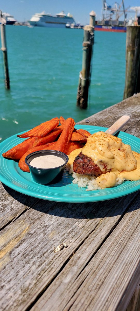This month's special is our spin on the classic surf and turf: a 6-ounce sirloin topped with shrimp, drowning in our signature seafood au gratin sauce served over a bed of rice, with side and a salad! Available all April long... at Rusty's at the Port!! 😎🥩🦐🚢 #rustysseafood