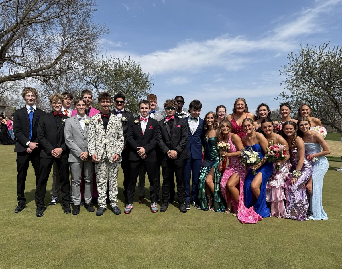 FFTrojanTrack's tweet image. Prom 2025 is in full swing. These tracksters posed for a group picture while looking sharp in their tuxedos and prom dresses. #PROM2025 #trojantrack #lookinggood