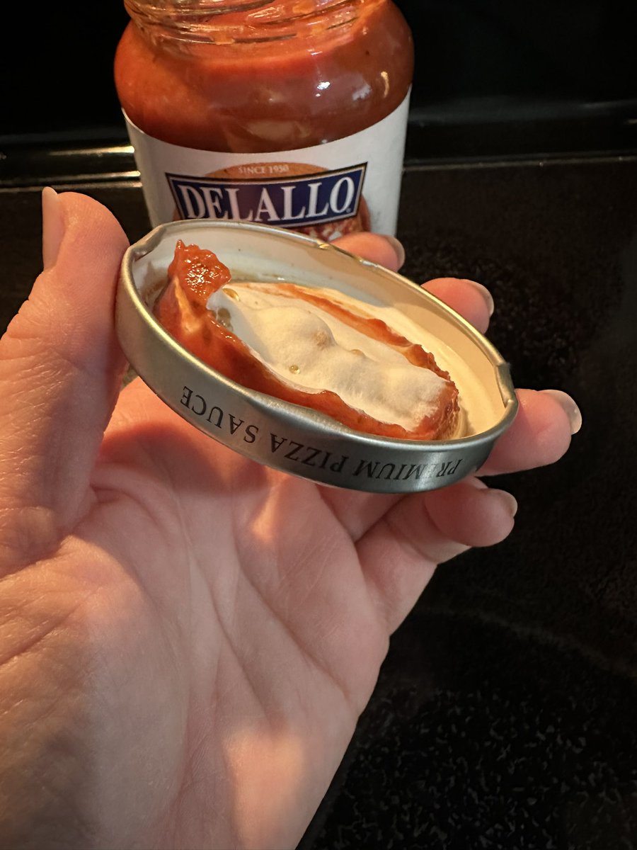 MrsWilson71's tweet photo. What is going on with the food industry? We make pizza once a week…this is tonight’s brand new can of sauce I just opened and the other photo was last week’s dough problem. Gross 🤢 https://t.co/br2Fabfgiq