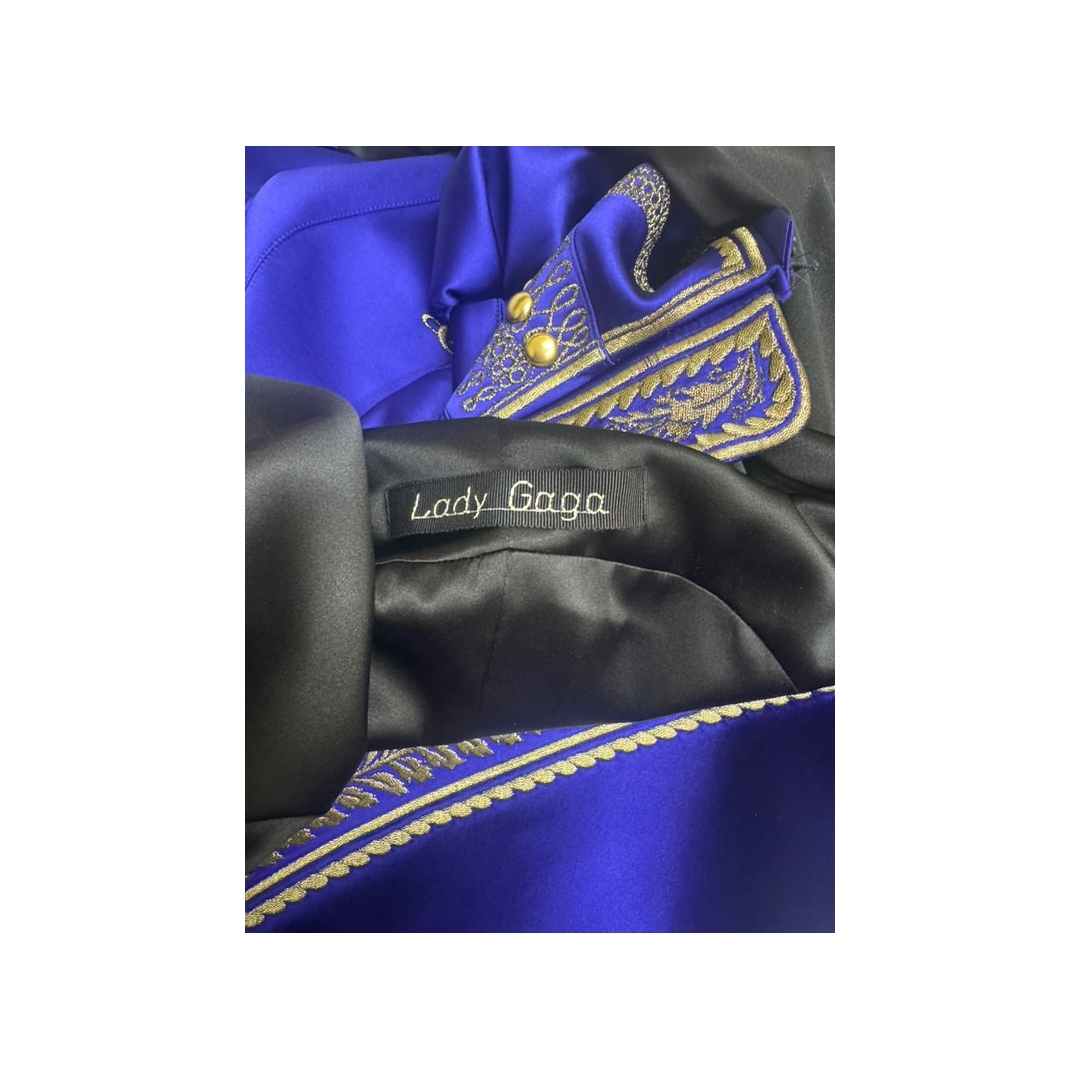 LaMaisonGaga_'s tweet photo. For "Zombieboy", Gaga wore a custom #SamuelLewis x #WilliamRamseur military-inspired blue satin bustle coat with embroidery done by #AltesaEmbroidery. Her paper feather helmet is yet another custom @MarniOfficial piece! https://t.co/LnB2B5ezyf