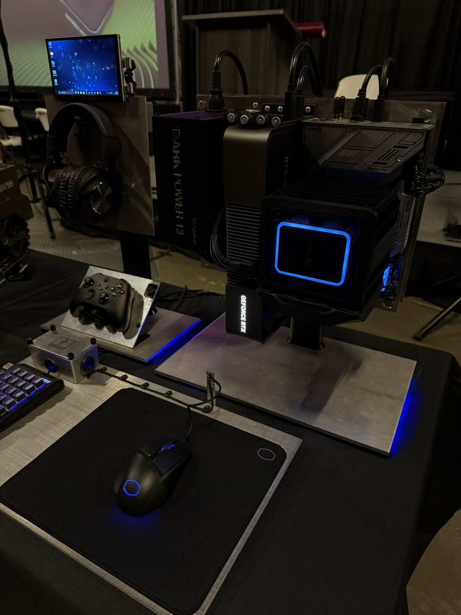 GeForce_JacobF's tweet photo. Time for the GeForce Garage case mod contest at #PDXLAN! The system with the tiny living room has an actual working screen ๐ https://t.co/lYFxZpnGjk