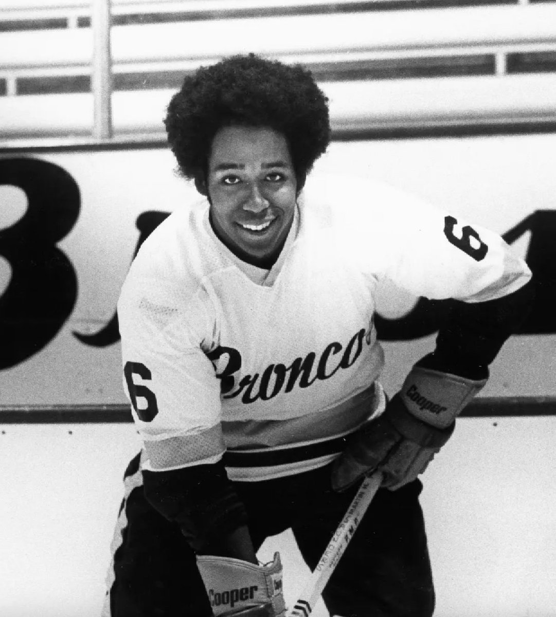 Western Michigan hockey alum John Saunders is looking down and smiling after their first national championship.