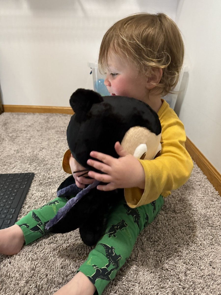 TheMikeBal's tweet image. When the baby finds the plushy @github Octocat that was going to go in your office…