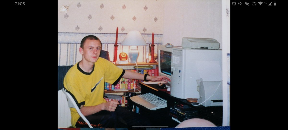 Trophy in the background, old computer, ridiculously handsome footballer...

Okay 2/3 wasn't bad. But then how many appearances did Maldini make in the South Yorkshire Amateur league!? As I hit about a 100.