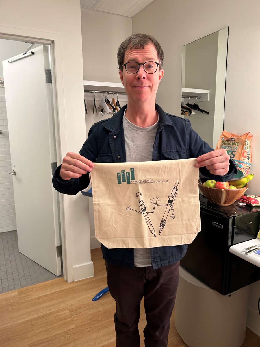 Happy Library Week! Ben Folds shows his support for MOLA librarians with one of our signature totes! You can support MOLA just like Ben - visit mola-inc.org/p/donate or text “MOLA” to 44-321 to donate today!