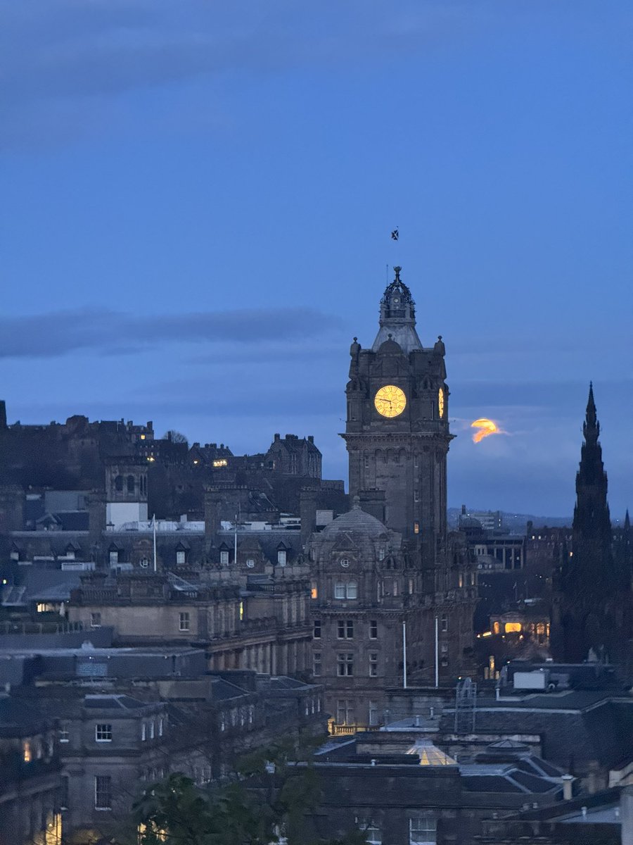 Pink Moon setting over Edinburgh Castle &amp; the Balmoral Clock

#PinkMoon