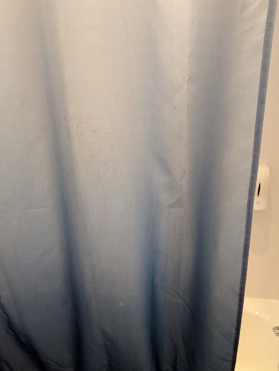 feebeefi's tweet photo. @TravelodgeUK Disgusting state of bathroom in one of your rooms in Fleet. Dusty extractor fan and blood on the shower curtain. Tried to complain but no one there at all! Should be ashamed! https://t.co/jshoHVZNlD