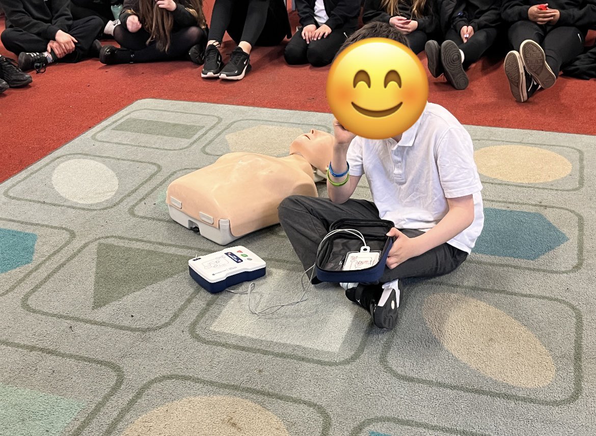 CultsSchool's tweet photo. Our P7 learners engaged in First Aid workshops with James from @BritishRedCross. They learned about what to do in an emergency, including CPR and defibrillators. Thank you, James! @Schools_Digital #TeamCPS #aberdeenlearns #firstaid https://t.co/LWeFvyZav2