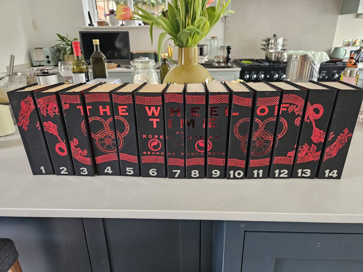 DomNeedler's tweet photo. My sister just finished rebinding my Wheel of Time paperbacks into hardback with fully custom designs as a birthday present... shes set the bar WAY too high 😂 https://t.co/ttkXIENgxU