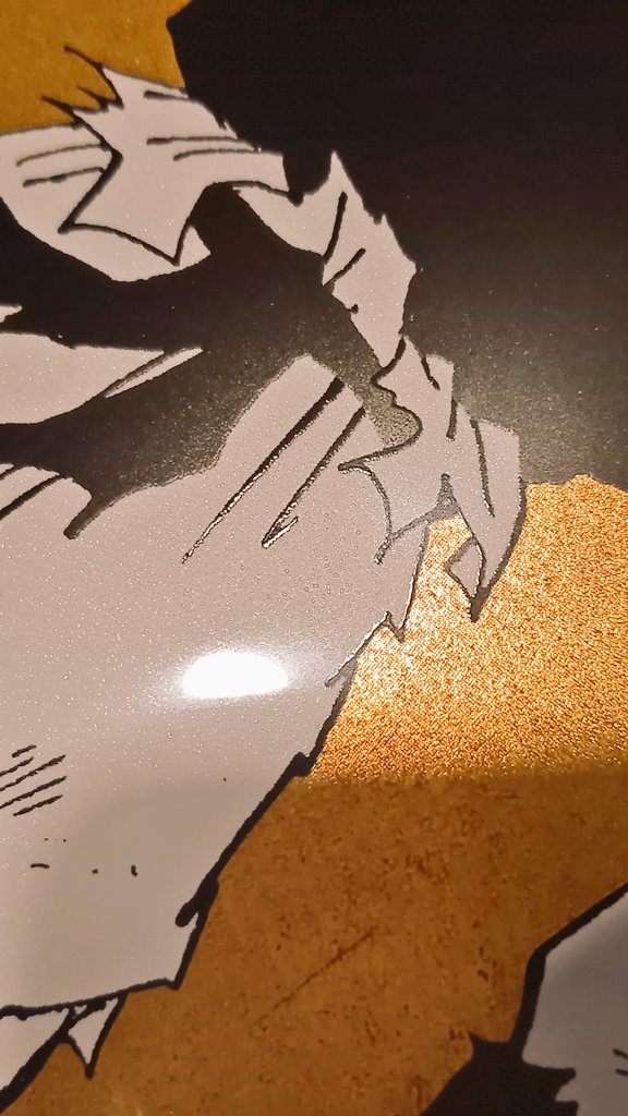 関西万博のドラゴンボールポスターをまじまじ鑑賞中。改めてコレはスゴ