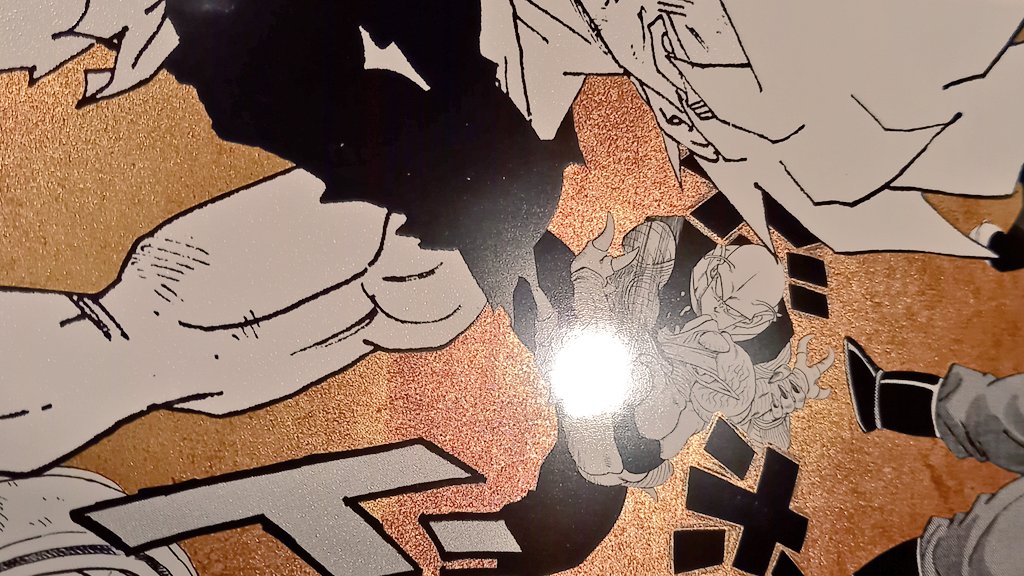 関西万博のドラゴンボールポスターをまじまじ鑑賞中。改めてコレはスゴ