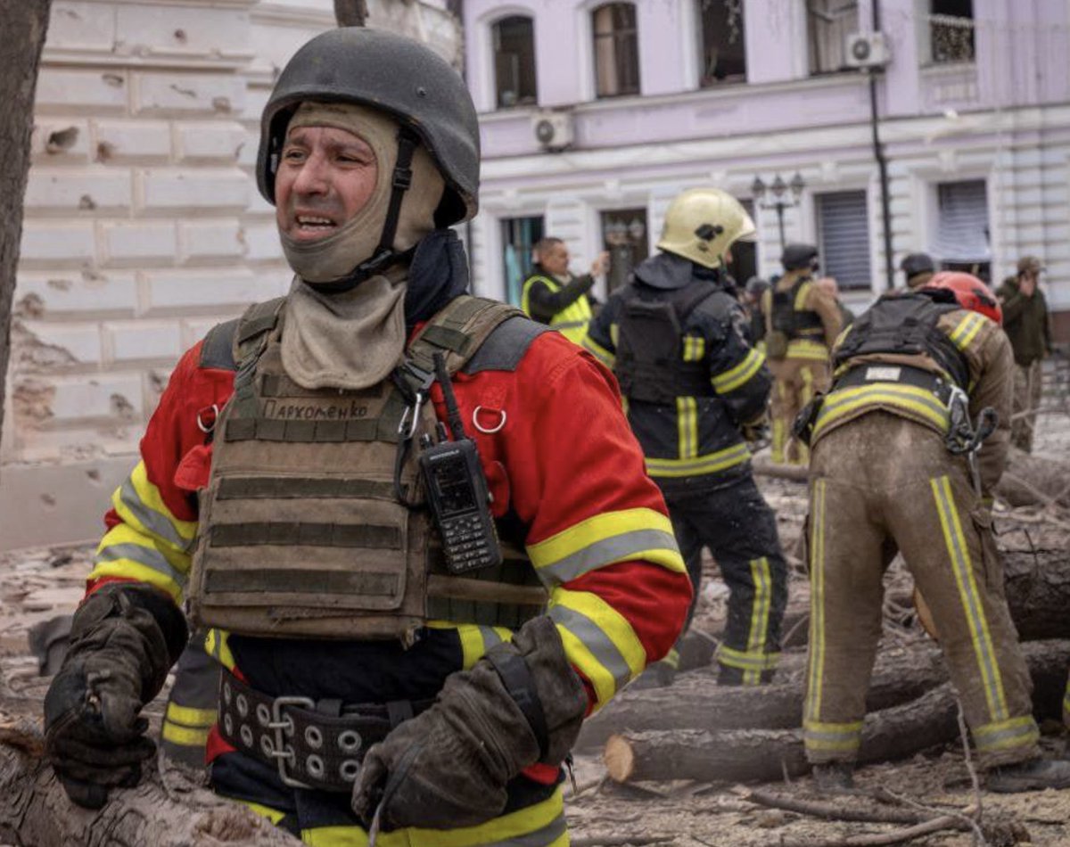 WarMonitor3's tweet photo. The face of Ukrainian firefighter in Sumy after spending hours clearing debris and uncovering bodyparts of Women and Children killed in Russia unprecedented missile attack on a town square. https://t.co/Mko0psnawC