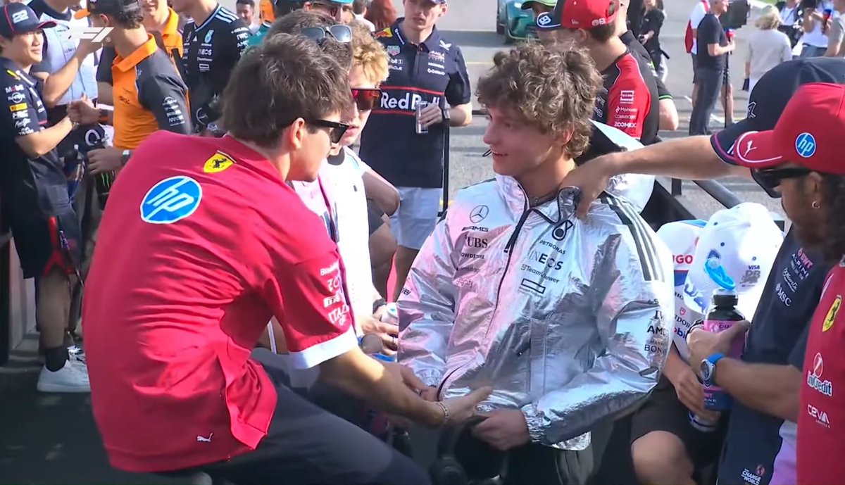 Vetteleclerc's tweet photo. Kimi wearing a jacket and Charles checking it lol https://t.co/3zrznJgsuT