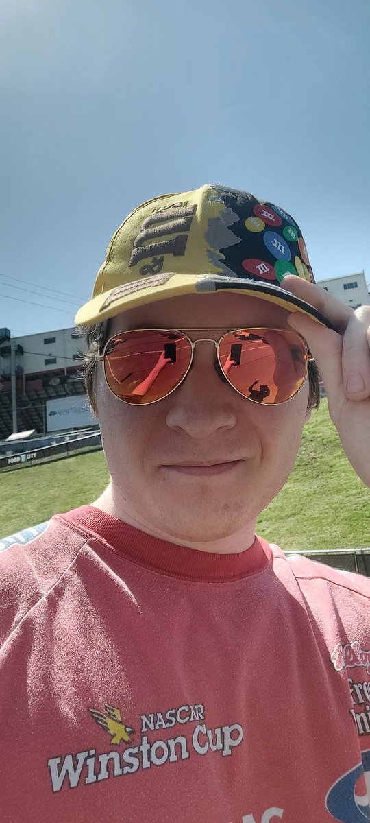 Goofy lookin guy in the m&amp;ms hat and jeff gordon t-shirt, reporting for duty