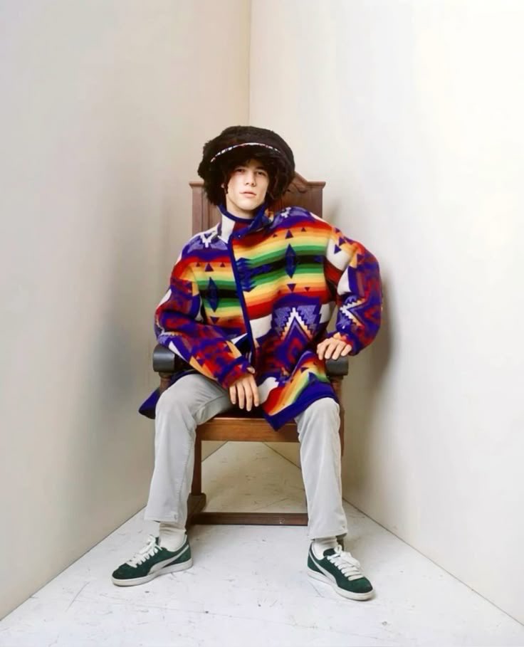 JamiroquaiDaily's tweet photo. Did you know? Jay's jacket, known from the EOPE era, is actually a transformed Pendleton blanket. The patterns on the coat are inspired by Native American designs. #jamiroquai #eope https://t.co/kRj9owWMyO