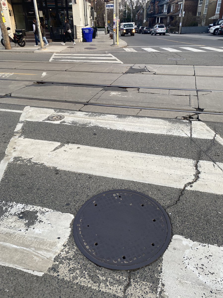 Hey <a href="/311Toronto/">311 Toronto</a>! When is this piecemeal repair going to be properly repaired? Just watched someone fall in the middle of the street because they tried to avoid one hole, only to fall into another. Dundas/Dovercourt.