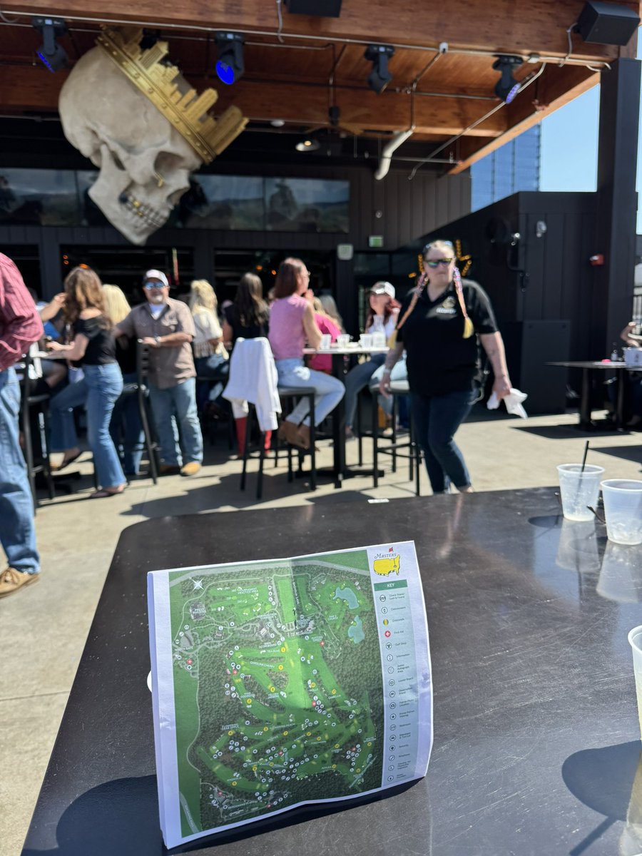 thebigslime0's tweet photo. Spectators guide in hand while watching the masters at the rooftop bar? Could be the move https://t.co/hFWgwp2Fmz
