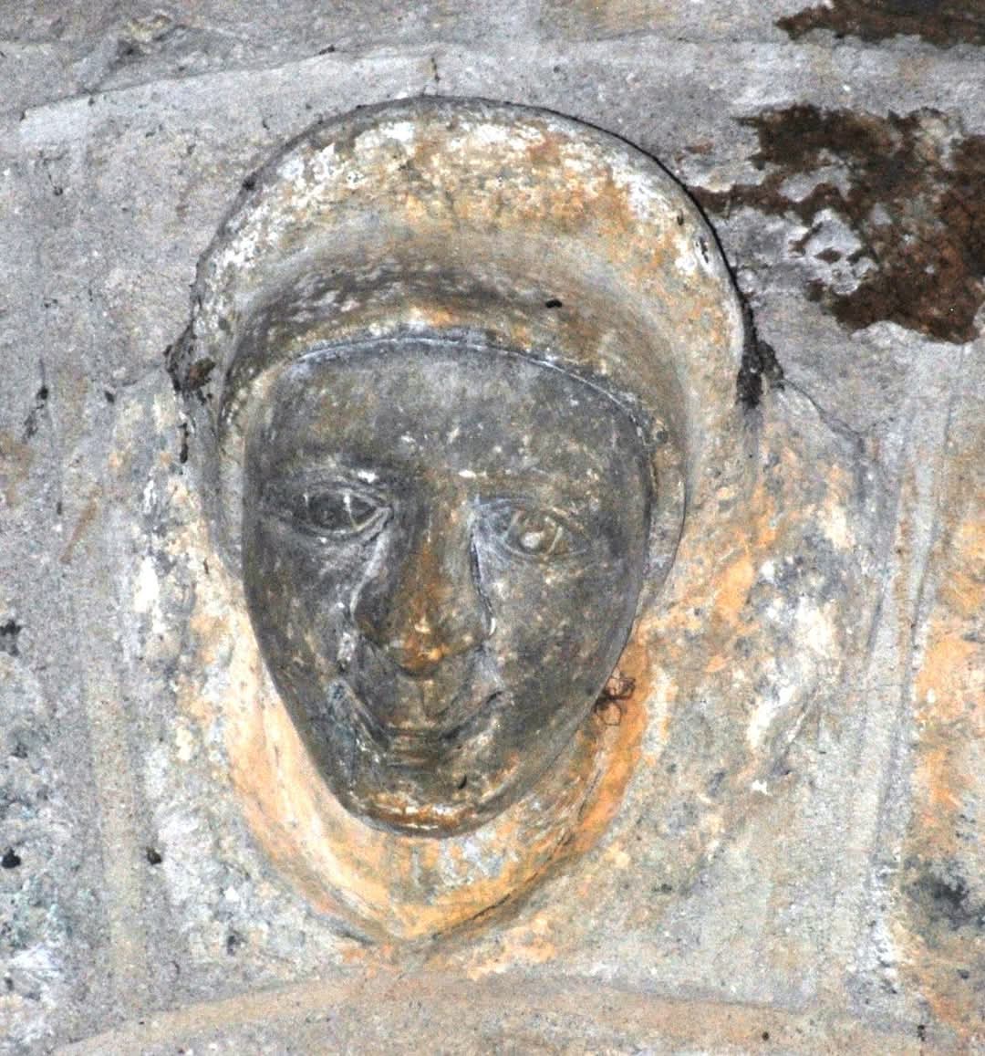 A late medieval female head above the chancel arch in Clonfert Cathedral. Could it be the Virgin Mary or perhaps a female patron? We know that the Butlers of Ormond had a reason to have their Coat of Arms carved on the chancel arch.