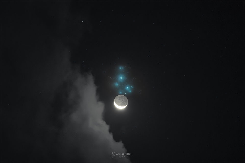 apod's tweet photo. Sometimes, the Moon visits the Pleiades. Technically, this means that the orbit of our Moon takes it directly in front of the famous Pleiades star cluster, which is far in the distance. The technical term for the event is an occultation, and the Moon is famous for its rare occultations of all planets and several well-known bright stars. The Moon's tilted and precessing orbit makes its occultations of the Seven Sisters star cluster bunchy, with the current epoch starting in 2023 continuing monthly until 2029. After that, though, the next occultation won't occur until 2042. Taken from Cantabria, Spain on April 1, the featured image is a composite where previous exposures of the Pleiades from the same camera and location were digitally added to the last image to bring up the star cluster's iconic blue glow.

Image Credit: Cayetana Saiz