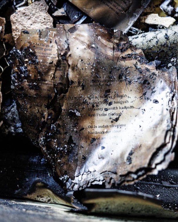 noatishby's tweet photo. Among the ruins of Governor @JoshShapiroPA’s home were Jewish Haggadahs — the special prayer books used on Passover. 

On the page, reads the lyrics of Hatikvah, Israel’s national anthem. 

…Od lo avdah tikvateinu
Hatikvah bat shnot …
Lihyot am chofshi
…Eretz Tziyon v’Yerushalayim

“…Our hope is not yet lost,
The hope of two thousand years,
To be a free nation
In our land of Zion and Jerusalem.”

Let me remind you, this firebombing happened just hours after Governor Shapiro and his family hosted their Seder.

A Jewish governor.
On the first night of Passover.
This should alarm everyone.