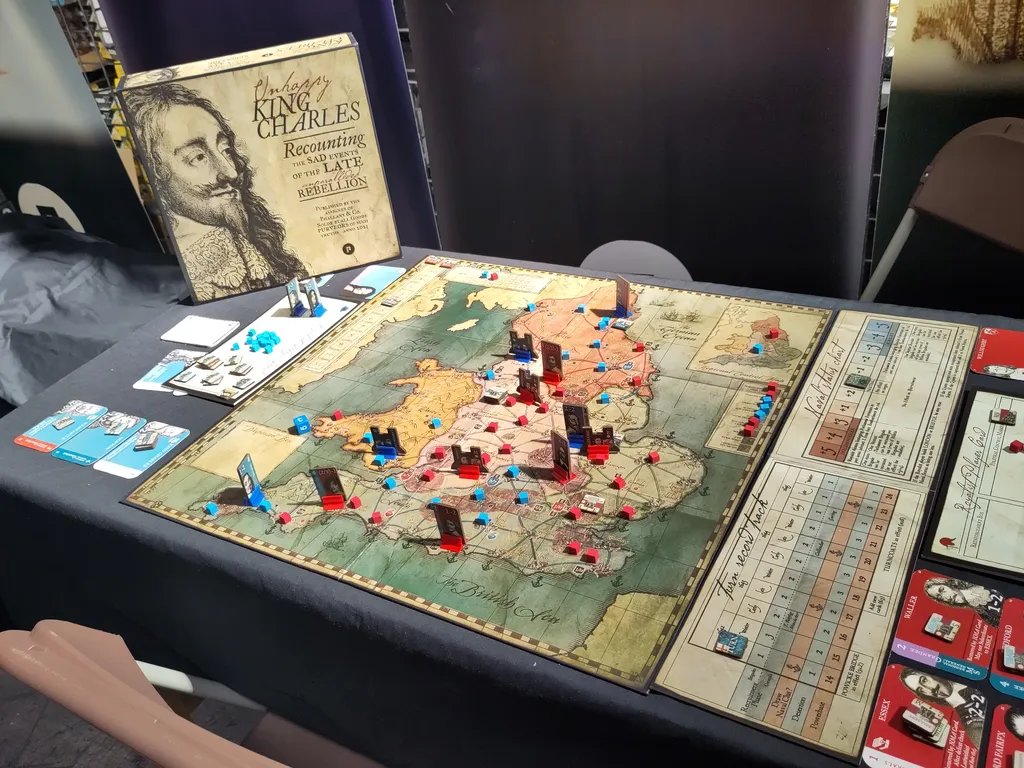 The prototype for Unhappy King Charles, demoed at UKGE back in 2023.

It's gone through some slight graphical changes, but since late 2024 the game has begun arriving in the hands of eager players worldwide!

If you've received your copy and enjoy the experience, please be sure