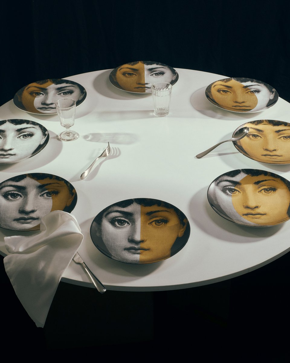 The table becomes a stage.
With Lina Cavalieri in lunar moods and whimsical cats lounging across porcelain, every meal turns into a surreal ceremony.

Discover more on Fornasetti.com