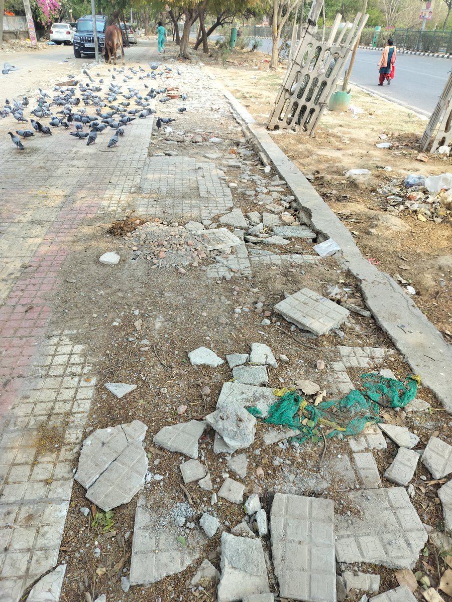 manoj_216's tweet photo. 🚨 A suffering tax payer's letter
Before we compete with China, we seriously need to learn the hitech skill of "repairing footpaths".
I thought I would avoid sharing this, but then, it seems nothing works nowadays if the issue doesn't get public attention.
Below are the pics of a footpath in front of our society four months after the repair work started. 
There was a 2 meter broken part of the footpath (yes, that's true, in fact less) which the authorities decided to repair. 
The expectation to finish the repair work was max 1 week time even with Indian standards.
Actually, privately done, it's a day's job.
The contractor has shelved the work and there's no activity for the last one month.
No authorities are listening to us.
Where else should we go?
For reference, at the same time that we hopefully repair this footpath, China would have built a 1,000 bed hospital+ a ten storey building + a bridge + a 300km fully operational railway line.
Just provided the China data for reference. I don't have any expectations.
Pls don't tell me that we can't build a footpath because, unlike China, we have democracy.
Tagging whoever I can and hoping someone listens.
~ A suffering tax payer !

Location: 
Sector 7, Plot 14, Dwarka, New Delhi

@MCD_Delhi @gupta_rekha @PMOIndia @narendramodi @BJP4India @ndtv @IndianExpress @ANI @INCIndia @SupriyaShrinate @RahulGandhi