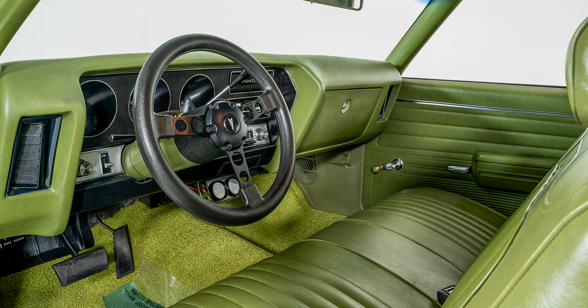 FastLaneSTL's tweet image. This 1971 Pontiac LeMans T-37 might look subtle in its Limekist Green paint and bench seat interior, but a 455 H.O. V8 is ready to surprise under the hood. Factory colors, period-correct wheels, and muscle car power done right.

See more at fastlanecars.com/vehicles/4176/…