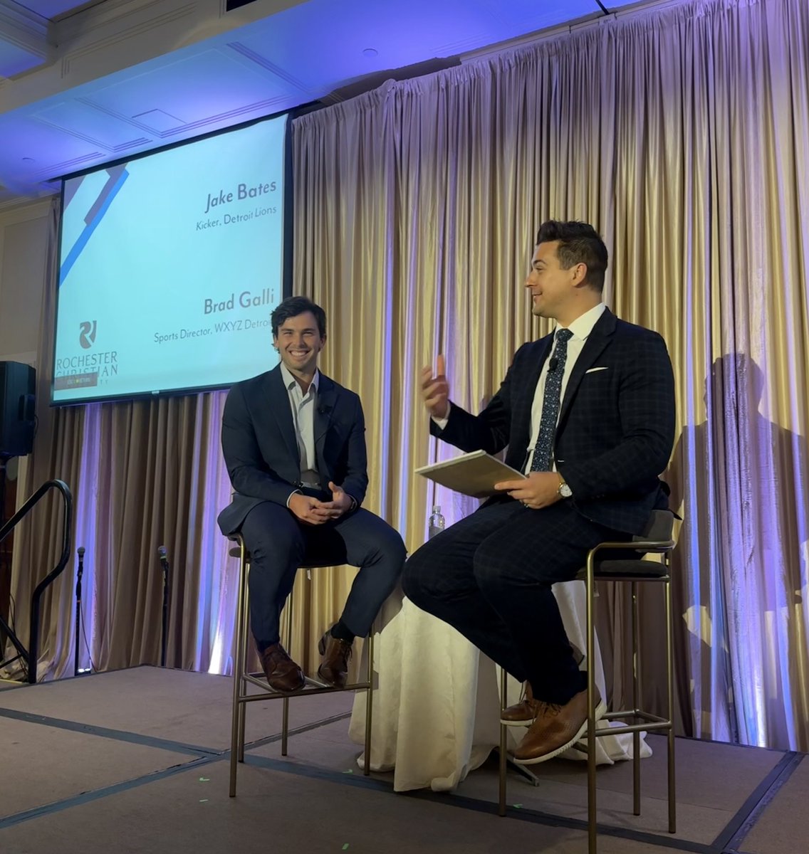 BradGalli's tweet photo. Lions kicker Jake Bates was the guest speaker at Rochester Christian University’s annual dinner Saturday. I hosted the Q&amp;A with Jake, whose story has so many crazy steps along the way to Detroit. 

His message will go a long way to help get scholarships to kids who need them. https://t.co/ib7iFL8ONP