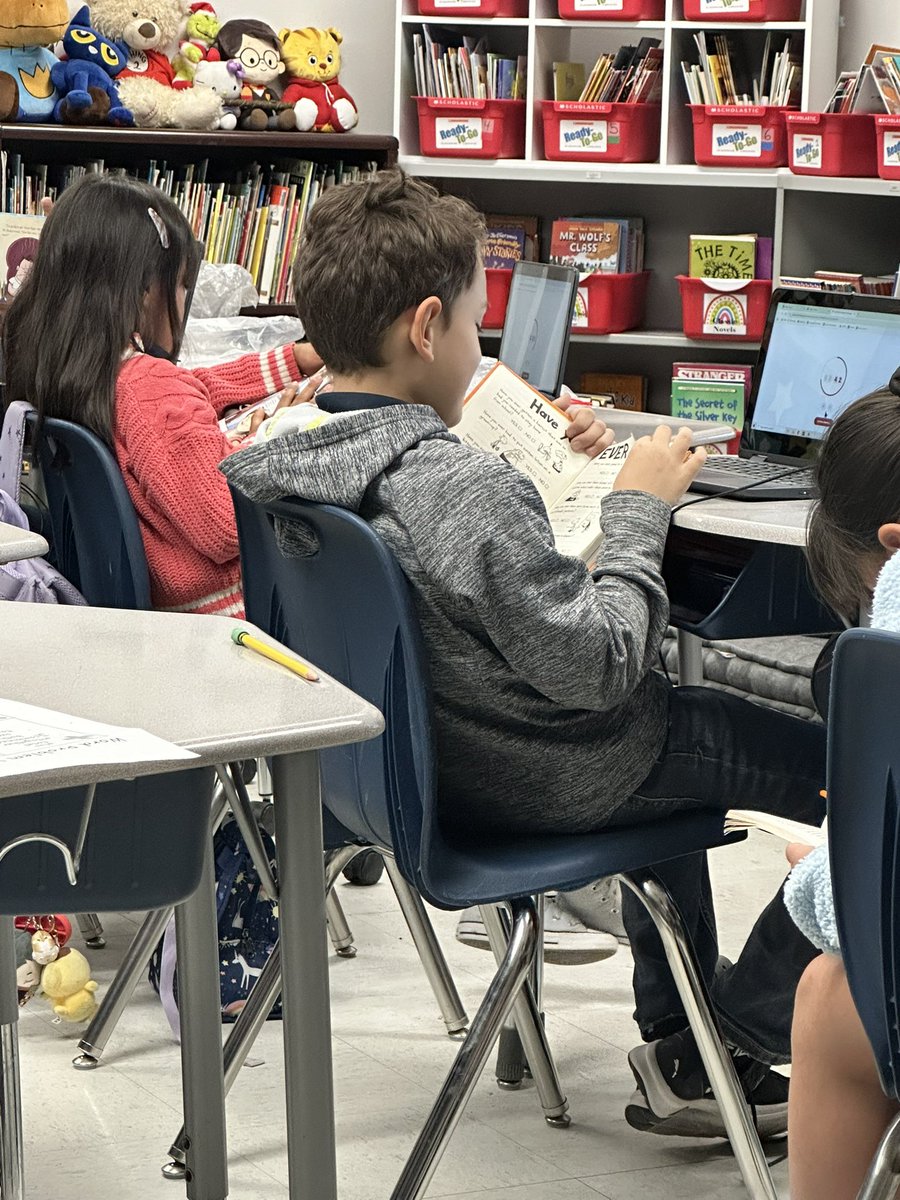 Our favorite time of the day!!!! Beanstack Silent Reading! Putting in our own minutes to keep that trophie!!! <a href="/JBaldwin_BMES/">Jeff “Guybrarian” Baldwin</a> <a href="/zoobeanreads/">Beanstack</a> #PatriotPride #TeamSISD landing.beanstack.com/socorro