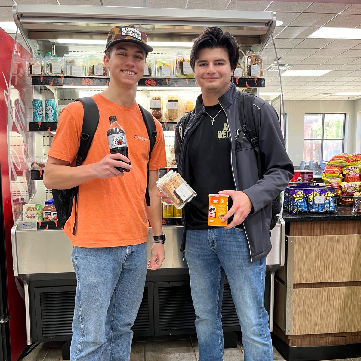 Caught red-handed… with snacks from our market 😎🍕🧃 Warning: May cause sudden happiness and food comas.