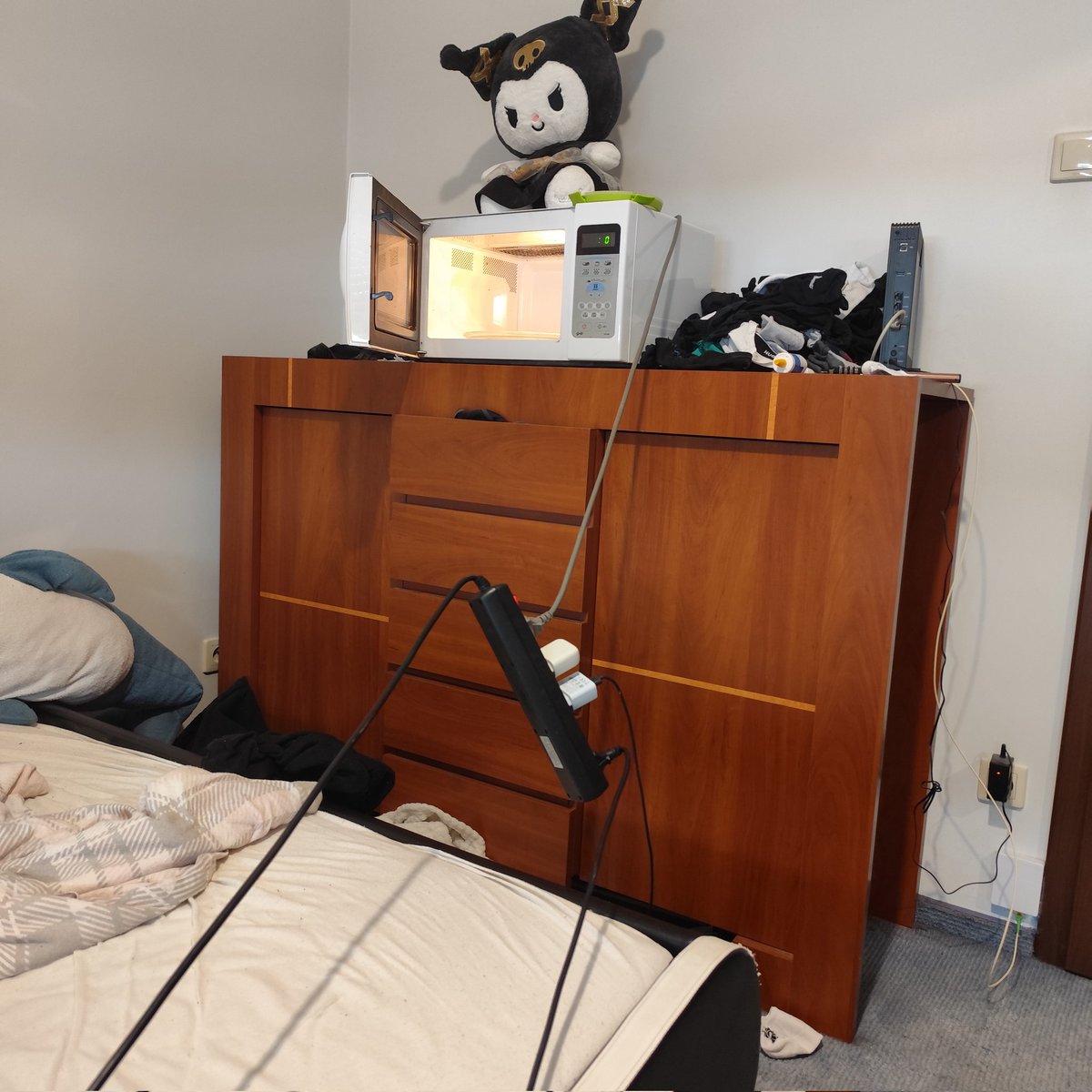 bedroom microwave set up with a floating power board Lowkey good as fuck when you don't got a bitch in your ear telling you it sucks