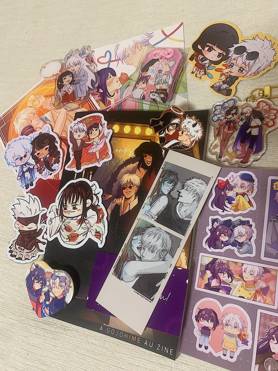 she is here!! my GoUta Zine V2 has arrived!! i was able to grab all of the cute merch from the leftover sales and i am soooo happy with everything :D
thank you so much <a href="/GojoHimeZine/">Five Songs 200%: GoUta Zine V2</a> for creating this project and everyone who came together to make it real <3