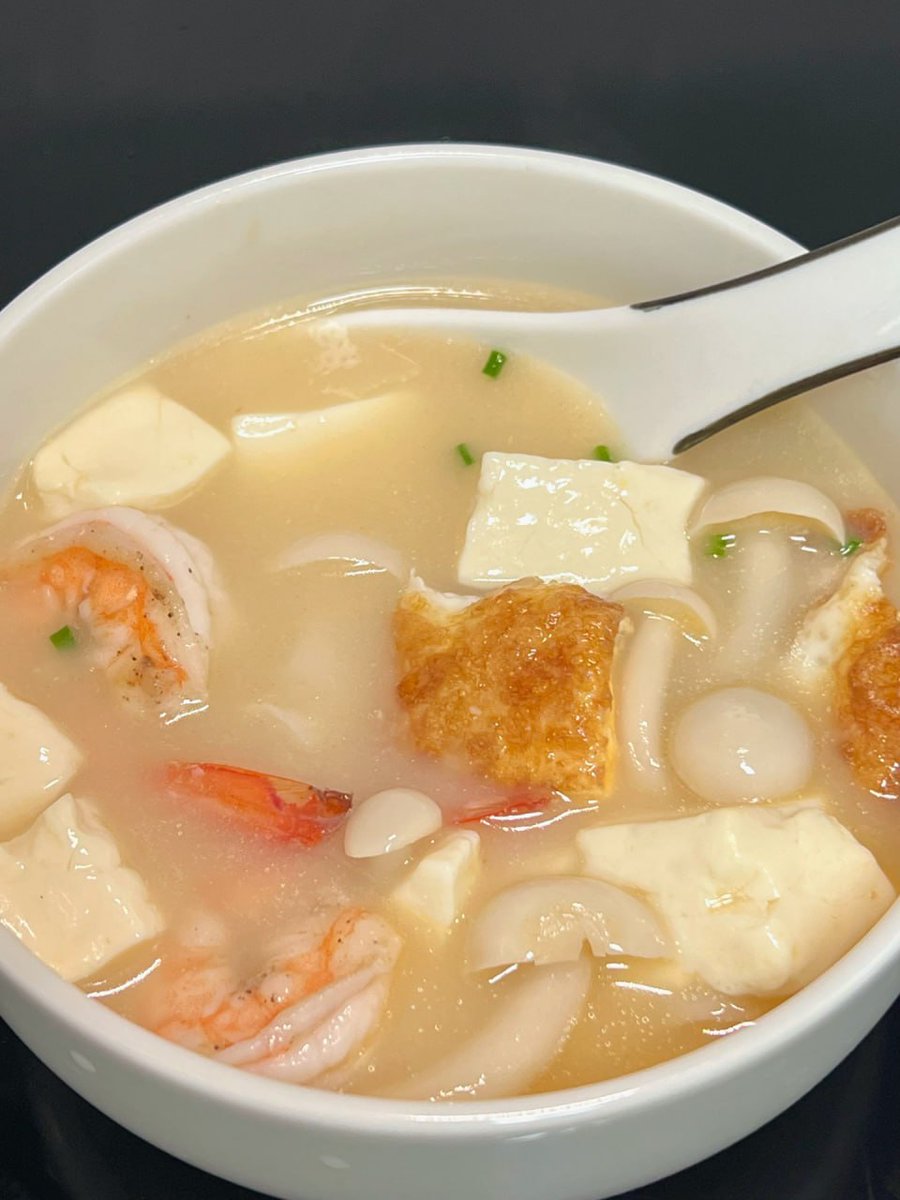 A warm hug in a bowl: seafood tofu soup for breakfast.