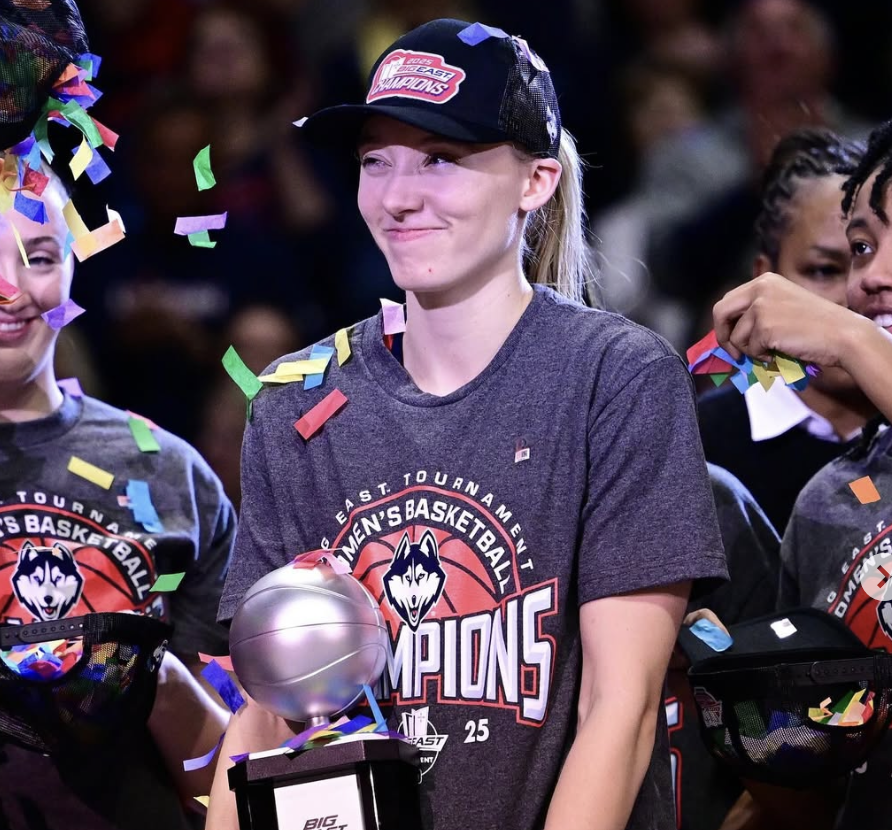 WomensHoops_USA's tweet photo. National champion Paige Bueckers is officially the FIRST  draft pick in 2025 and is now a Dallas Wing! https://t.co/3SW5CcPtkf